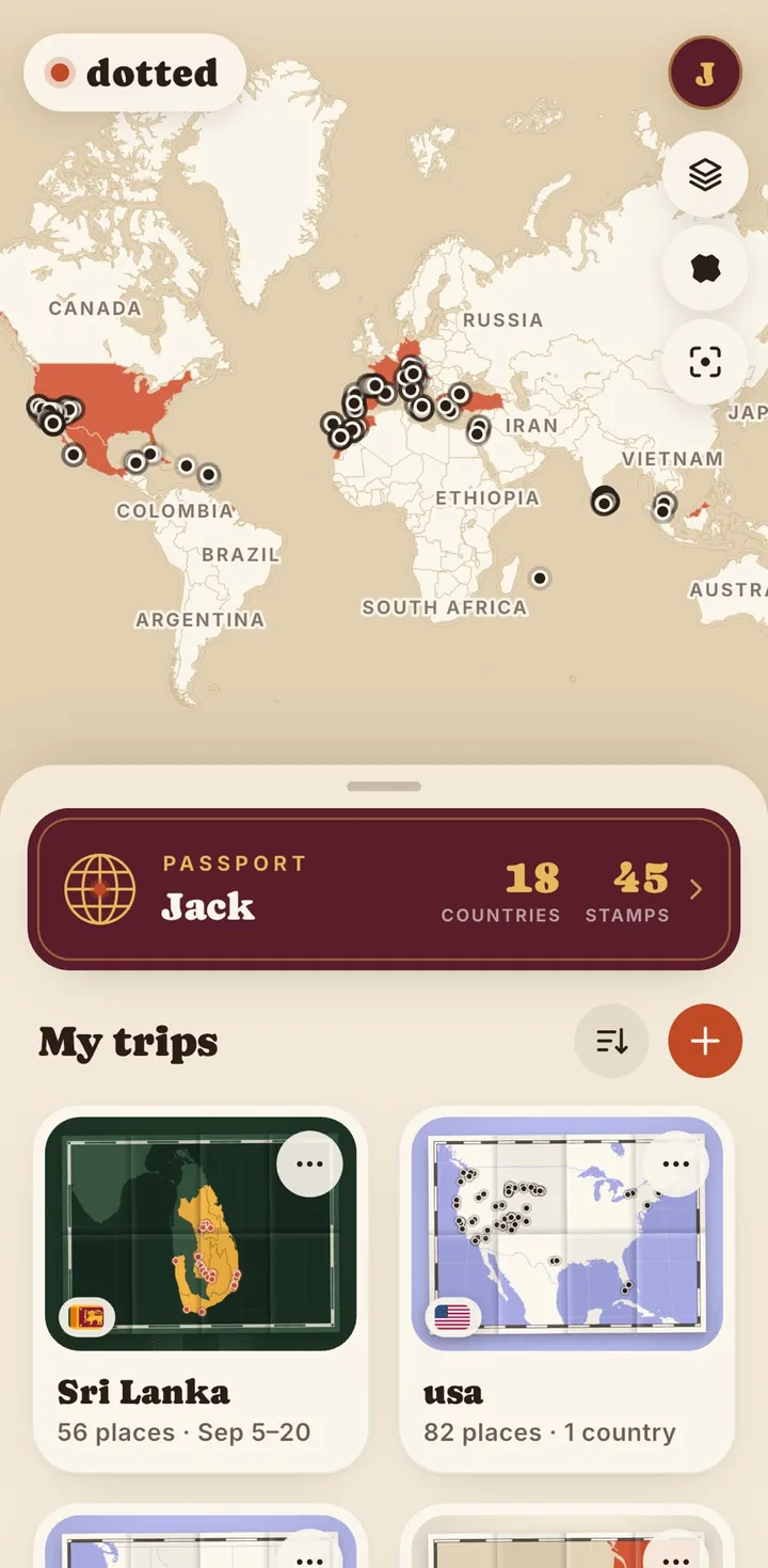 Dotted home: the world map with the dots, the passport and my trips